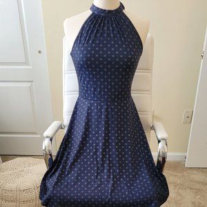 Navy halter dress with neck tie and keyhole back.
